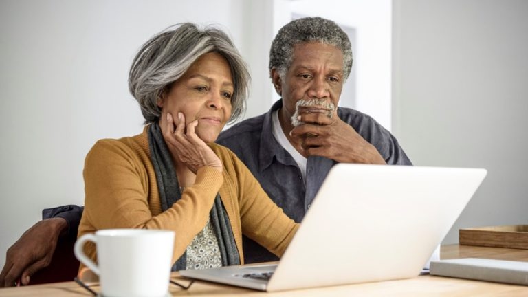 Couple looking at computer